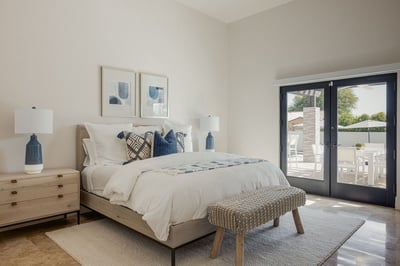 Guest bedroom 7 with King bed, smart TV, direct patio access and en suite bathroom.