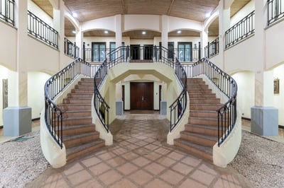 Beautiful staircase leads the way upstairs!