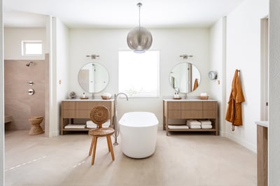 Primary en suite with dual sinks, vanity, large soaking tub and walk-in shower