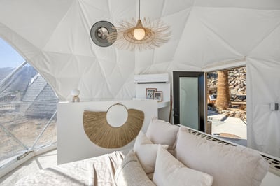 Guest bedroom with queen bed in the detached 