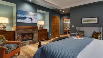 Primary suite with TV and fireplace