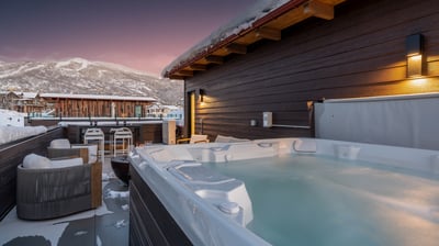 Hot tub with snowy Steamboat Resort