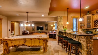 Billiards and wet bar on lower level