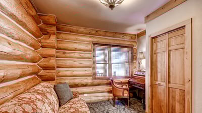 Office space with a queen sleeper sofa on main level