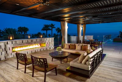 Gather around the outdoor fireplace and appreciate the calm of a quiet Cabo night