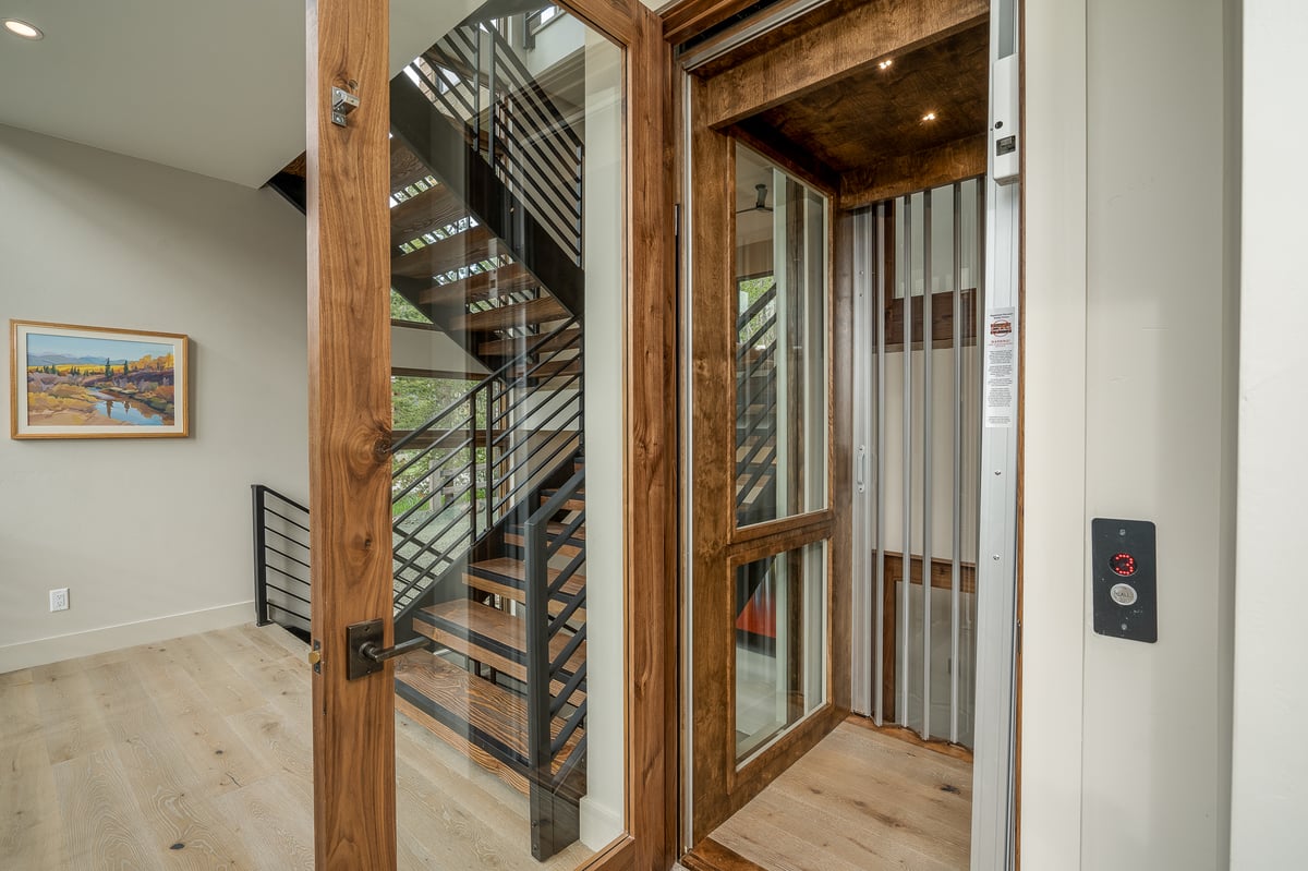 Glass-enclosed elevator to access all levels - Image 28