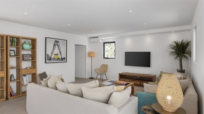Living Area: Spacious air-condtioned great room opening onto the pool deck on the back, with a 