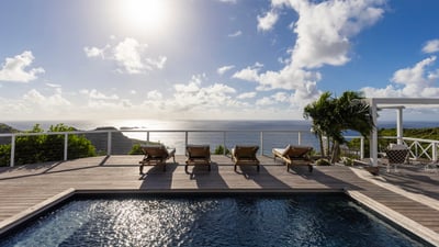 Pool & Terrace: Beautiful pool surrounded by a spacious sun terrace with deckchairs. Spectacular vie