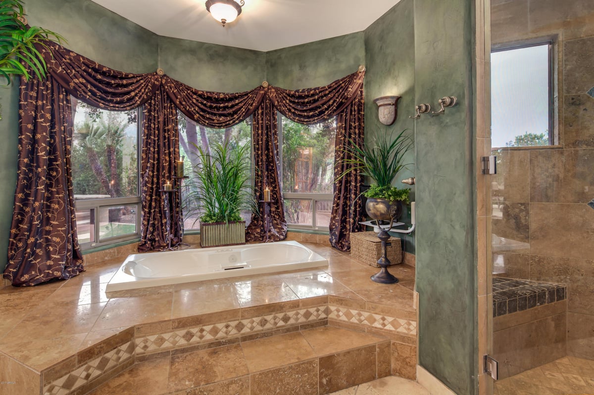 Raised Bathtub with Premium Drapes Looking into Interior Courtyard - Image 31