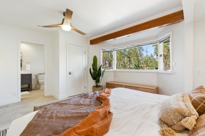 Iron: Guest bedroom two on second floor with King bed and direct access to shared bathroom with Copp