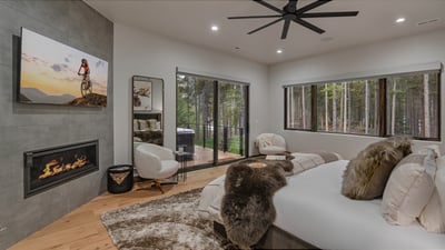 Primary king suite on main level with access to hot tub