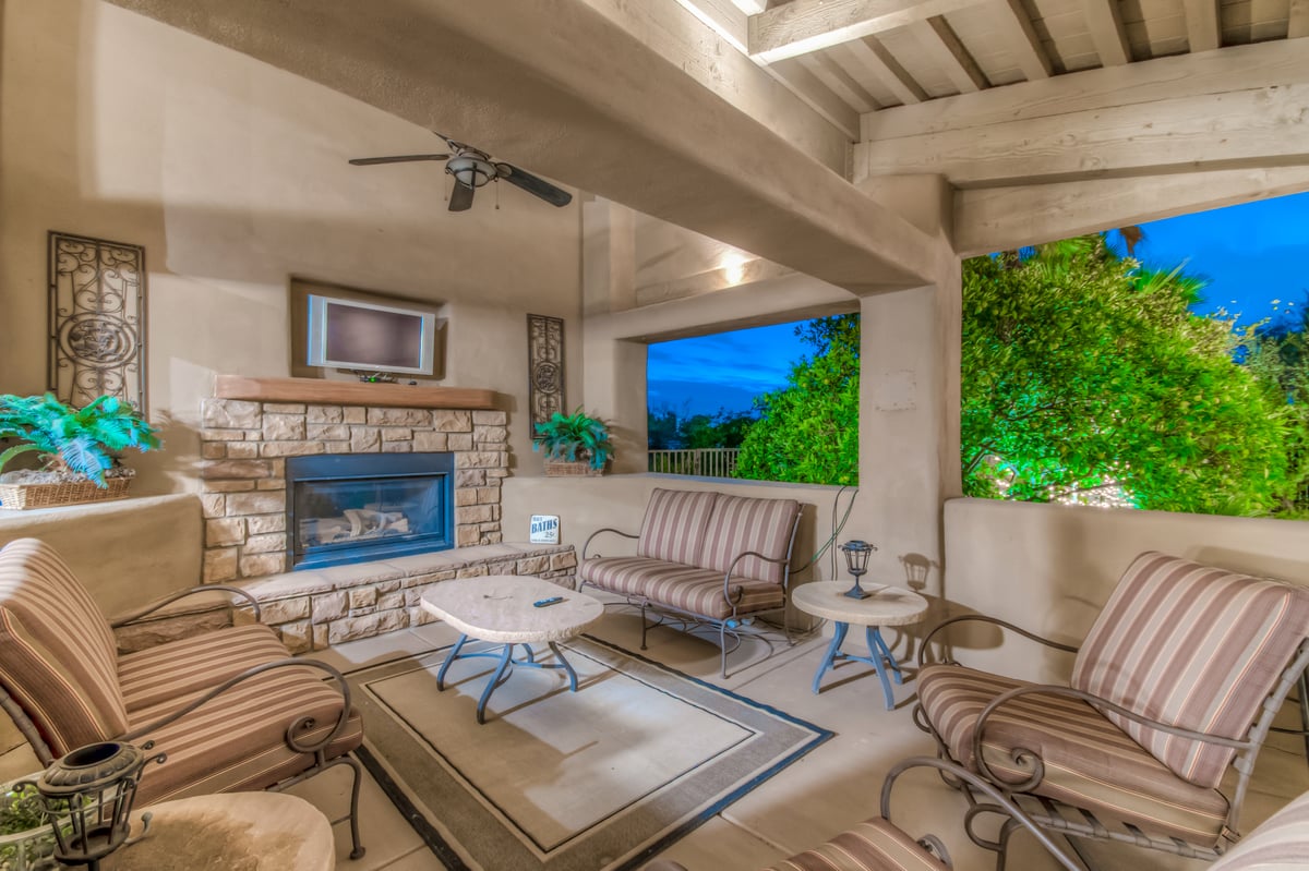 Outdoor Living Room with TV, Fan and Fireplace - Image 25