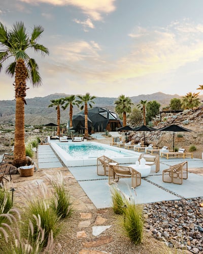 Plenty of lounge areas around the pool to enjoy the desert sun or relax in the shade under the umbre