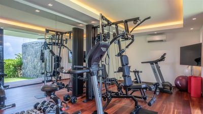 Fitness Room: Air conditioning, treadmill, sports accessories, including weight benches, weights and
