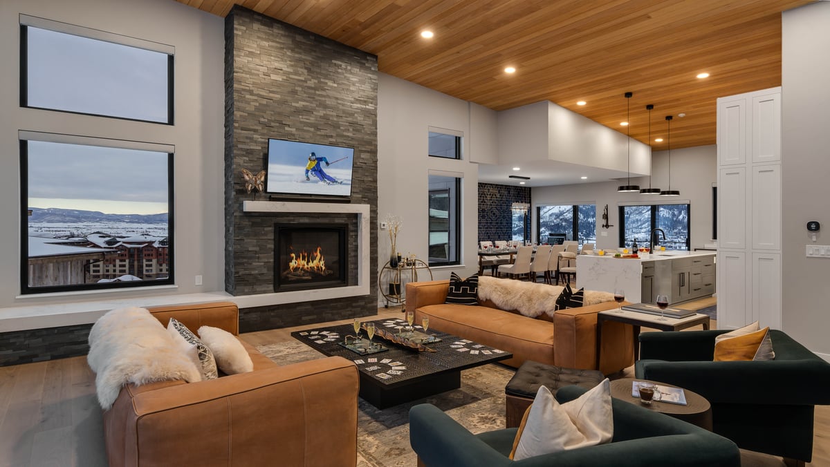 Great room with an open floor plan, fireplace, and TV - Image 3