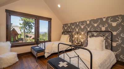 Twin bedroom on upper level, hall bath