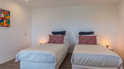 Bedroom 3: Located on the lower level. King size bed (or Twin beds), air conditioning, ceiling fan, 