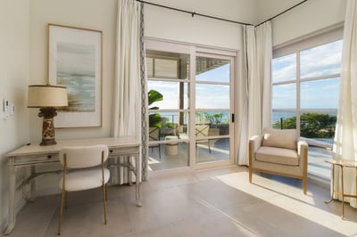- Settle in with a view at this stylish writing nook surrounded by bright skies
- Comfy chair invite