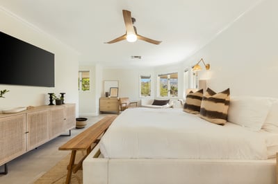 Quartz: Primary bedroom on the second floor with a cozy seating area