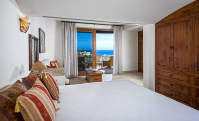 Plush cushions & patterned pillows add to the soft luxurious feeling you'll experience in Casa Tita!