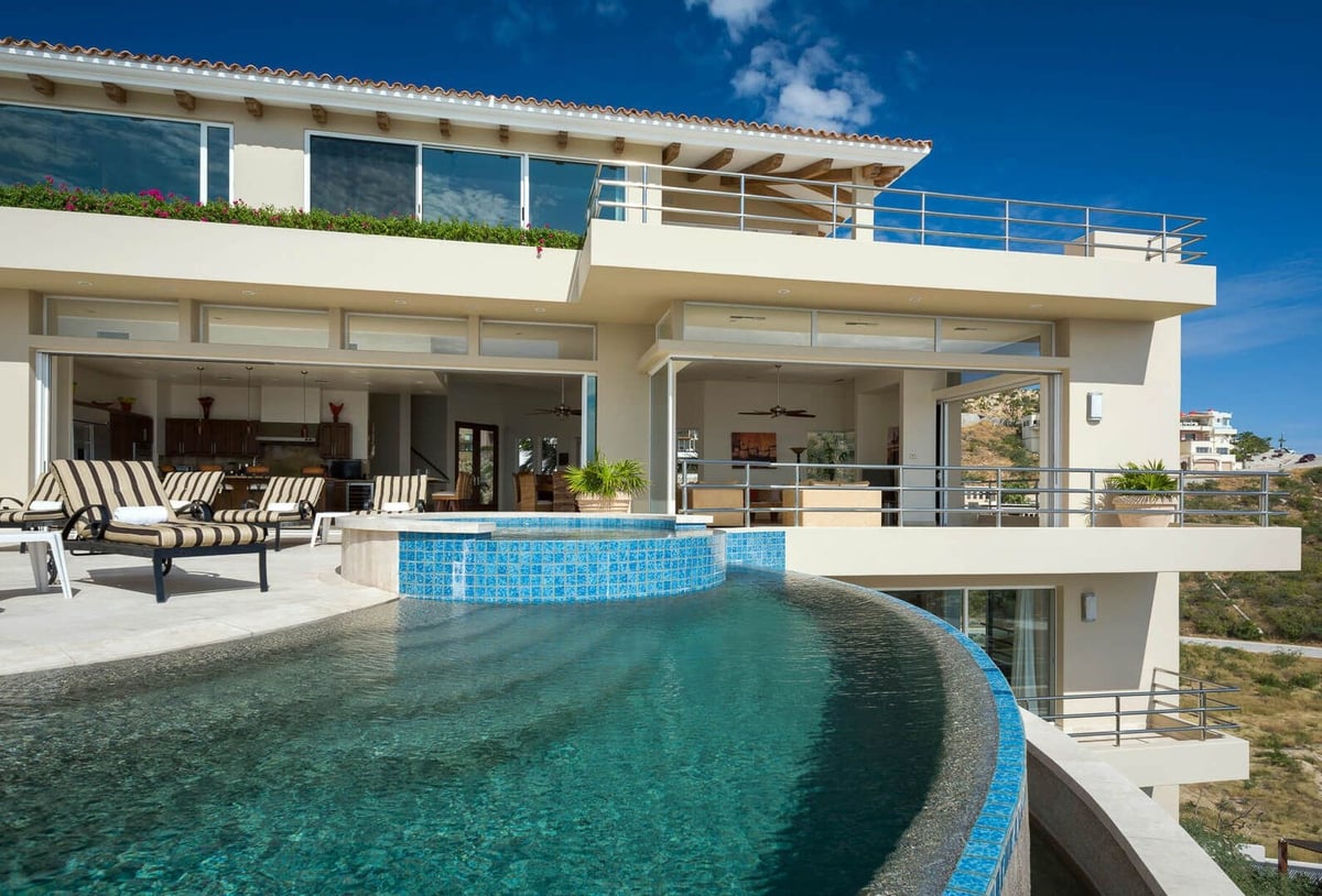 This luxury villa includes a spacious pool and Jacuzzi found on the expansive terrace - Image 7