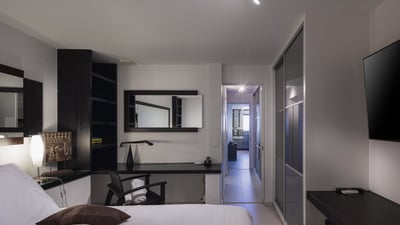 Bedroom 2: On a lower level. This apartment has its own private terrace with a table and chairs, ins