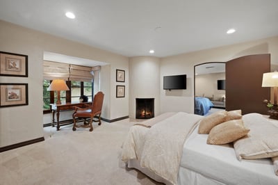Sink into plush linens and unwind in your spacious suite, complete with a cozy fireplace, elegant se