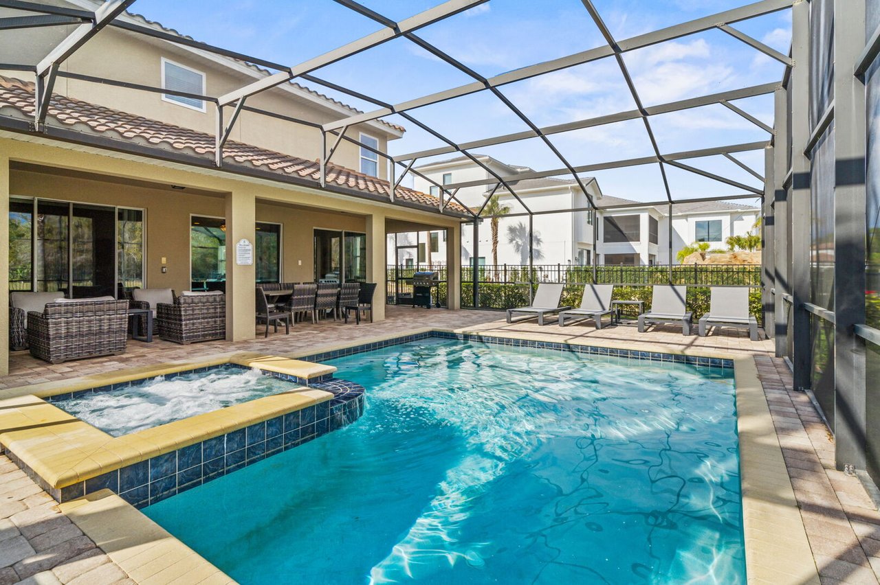 Screened private pool and spa at a Reunion Resort villa near Orlando