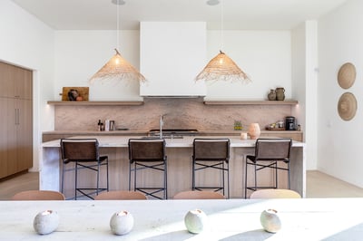 Stylish newly renovated kitchen with large granite waterfall island