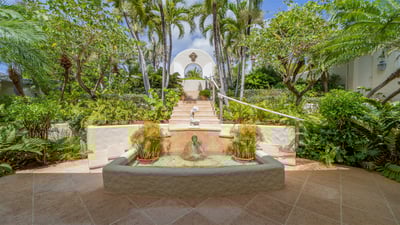 Outdoors: A lush tropical garden surrounds the villa with gaiacs, cactus & tropical plantings. P
