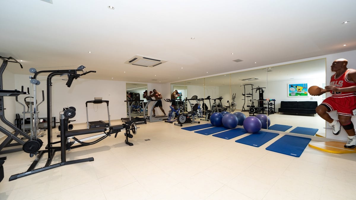 Fitness Room: In the basement. Large air conditioned fitness room equipped with a bicycle, elliptic, - Image 70