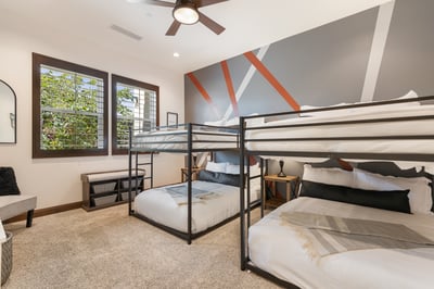 Guest bedroom 4. Two full size bunk beds to comfortably sleep 8. Shares full bath with rooms 2 & 3.