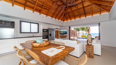 Kitchen & Dining Area: Air-conditioned kitchen equipped with electric oven, gas stove, microwave, fr