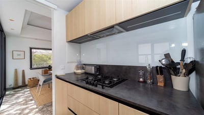 Kitchen & Dining Area: Fully equipped. Electric oven, gas stove, microwave, refrigerator, mixer, cen