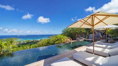 Pool & Terrace: Infinity heated Pool with steps. Expansive&nbsp;terrace with deck chairs and lounger