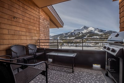 Savor morning coffee on your private balcony while gazing at snow-capped mountain peaks, with a conv