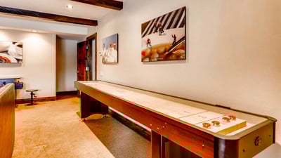 Challenge the family to some shuffleboard in the lower level family room