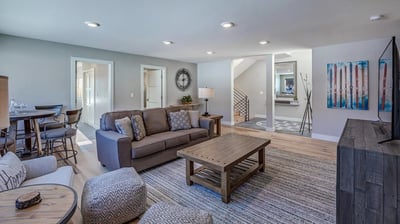 Mid level family room with TV and game table