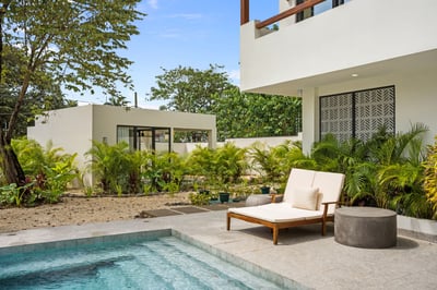 - Sparkling pool, surrounded by tropical landscaping and peaceful vibes
- Sun drenched deck features