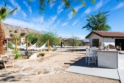 The play space at this property wraps around the entire back and side of the house! Hammocks, pool, 