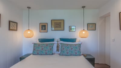 Bedroom 2: Located on the lower level. King size bed, air conditioning, ceiling fan, programmable sa