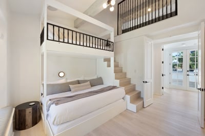 Suite 3: Bunk Bed with 1 queen and 1 twin, plus an additional twin bed & dual hidden seating areas i