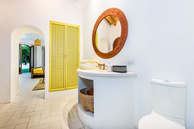 Step into the light-filled, roomy bathroom.