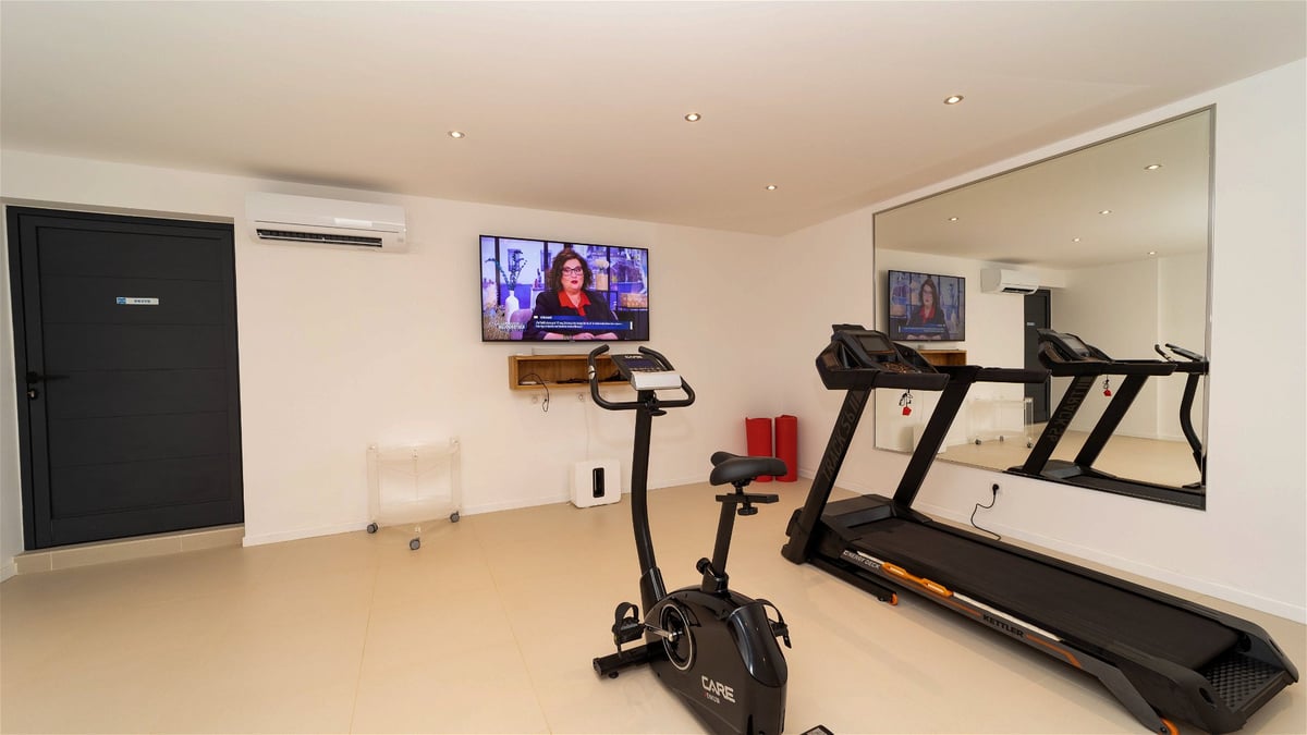 Fitness Area: Located in the basement. HD-TV, Dish Network, air conditioning, weights, treadmill.&nb - Image 58