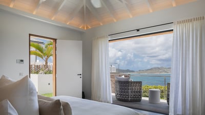 Bedroom 3: Located in a separate bungalow, only available when booking the entire villa. King size b