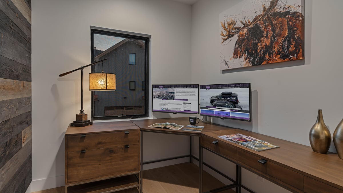 Find some solace in the office located on the main level of the home - Image 11