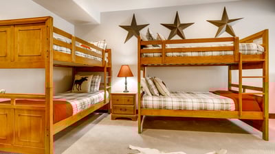 Bunkroom on lower level shares hall bath