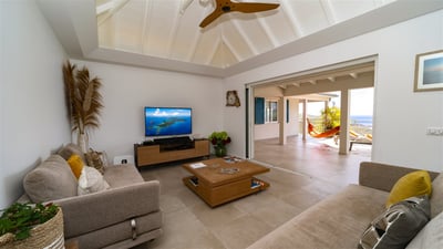 Living Area: Expansive living area opening onto the terrace. Air-conditioning, HD-TV, Dish Network, 