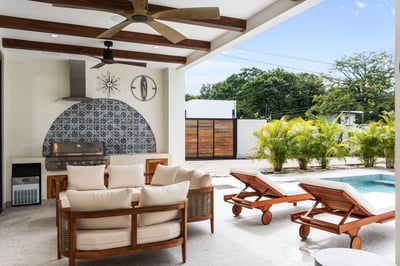 - Grill beneath exposed beams with hand laid mosaic tile detail & fully equipped outdoor setup
- Plu