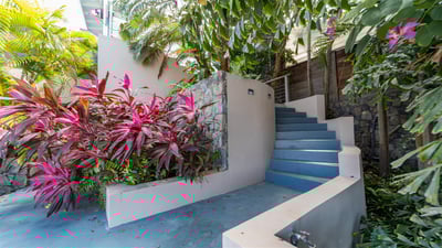 Outdoors: Private parking at the entrance of the property. 